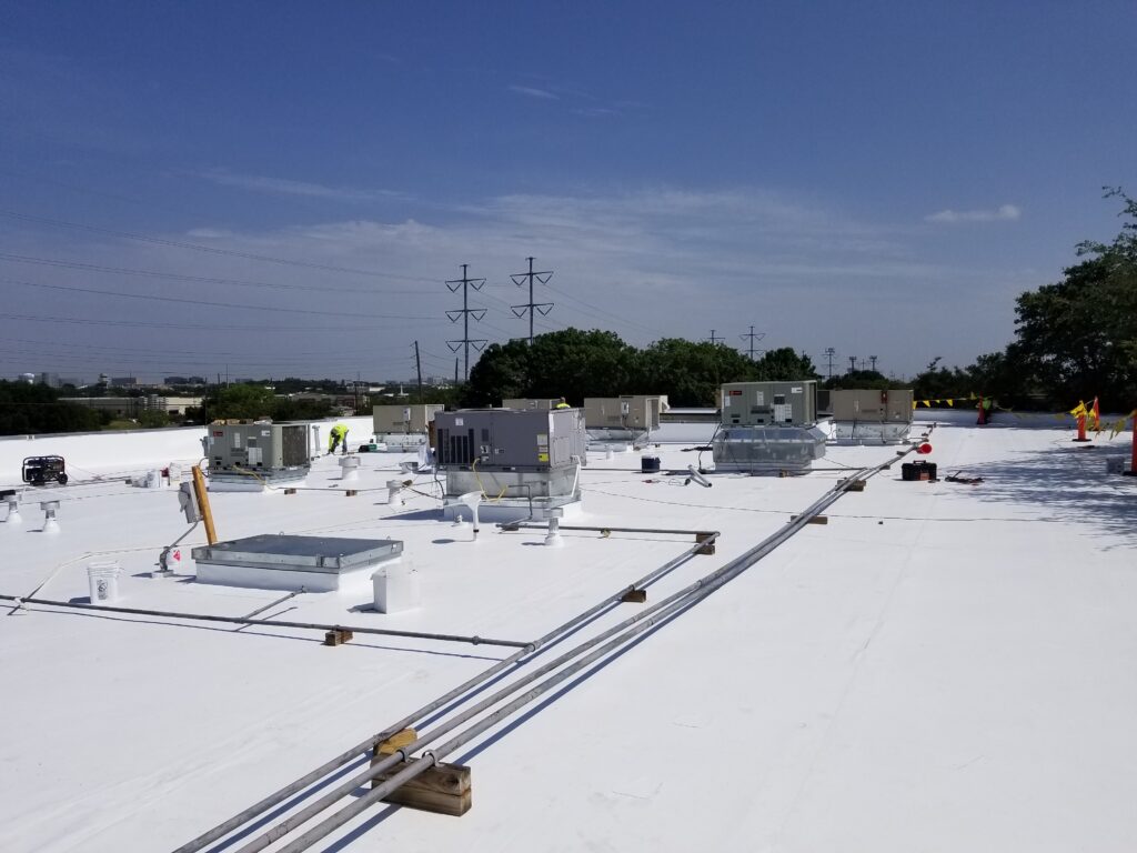 Commercial single-ply roofing installation in Dallas-Fort Worth, featuring TPO, PVC, and EPDM membrane systems by Martin Roofing.